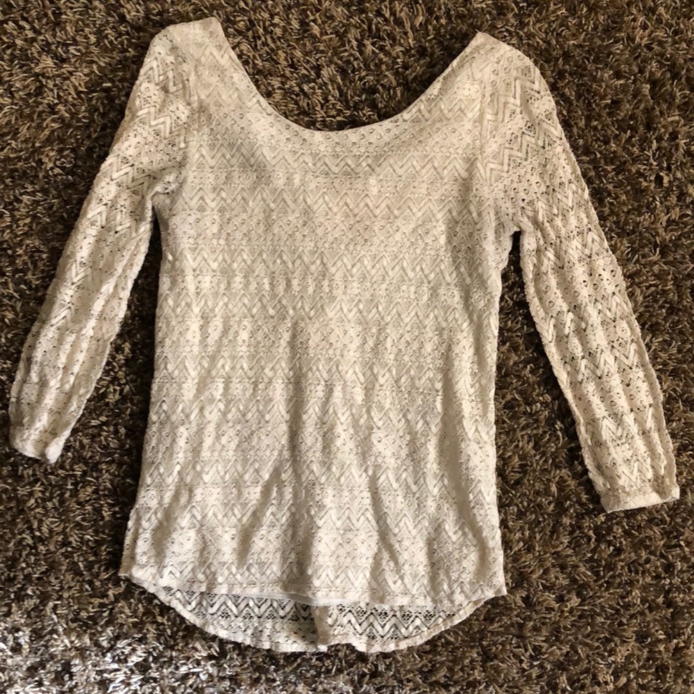 3/4 cream lace shirt with bow on back.